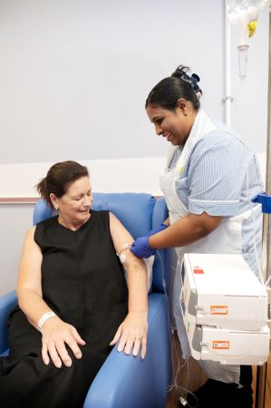 Photograph of a nurse wearing protective equipment